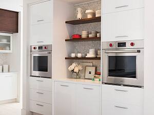 Two Wolf M-Series wall ovens.