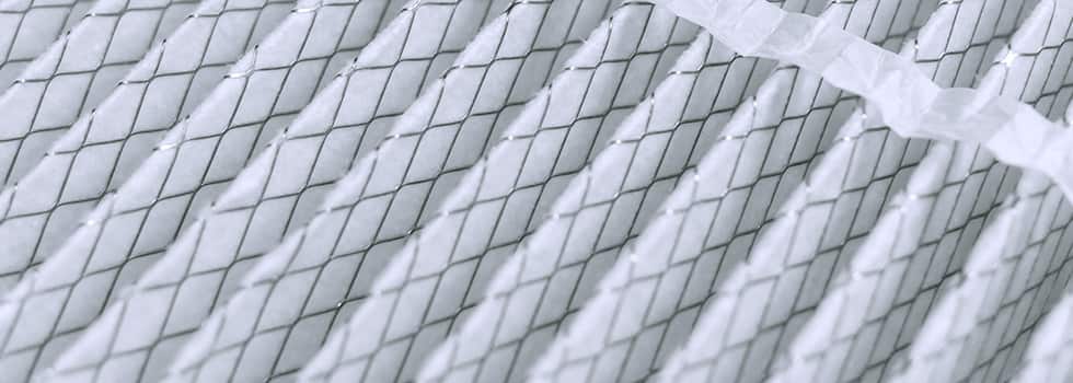Close-up view of the mesh side of an air filter.